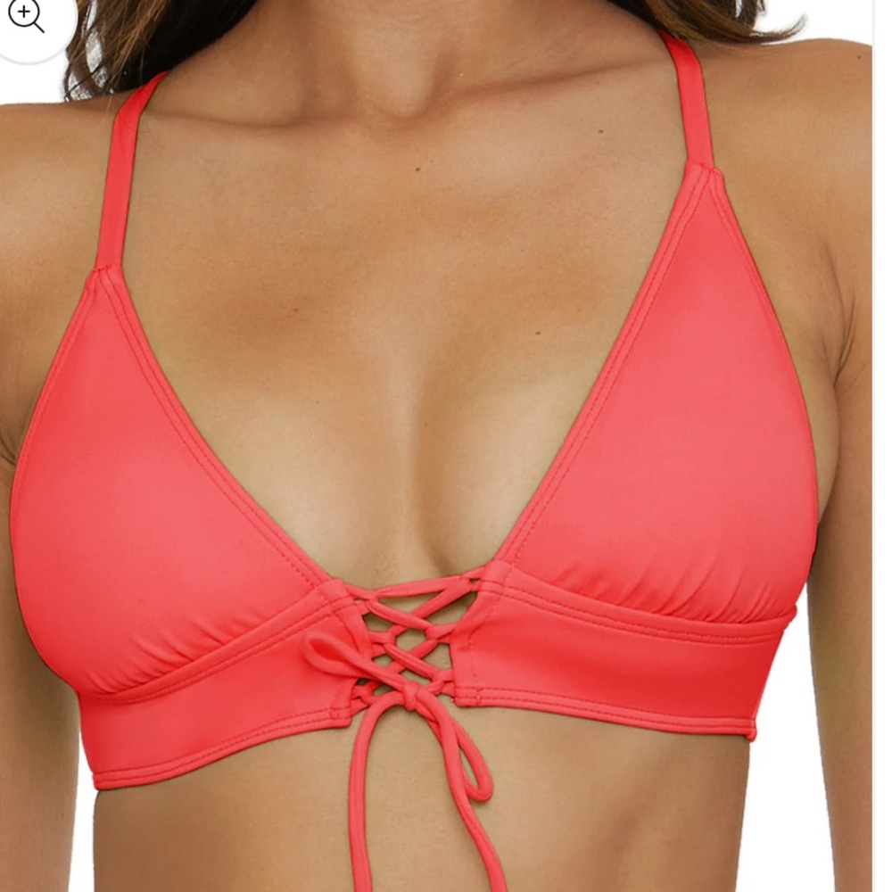 Becca standard lace up bikini top. Color is grapefruitt. Size medium.